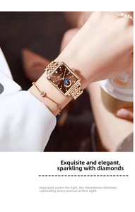 Close-up of rose gold rectangular watch with crystal bezel and sun-moon phase dial
