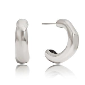 Macro detail of silver square C-shaped stainless steel earrings with glossy finish
