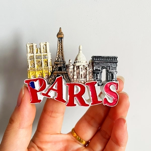 3D resin Paris fridge magnet featuring the Eiffel Tower and Notre Dame landmarks