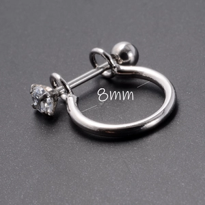 Macro shot of 8mm stainless steel cartilage earring with sparkling cubic zirconia inlay