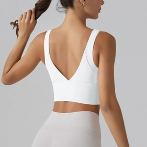 Detailed back view of white V-cut sports bra with wide straps for fitness yoga wear