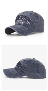 Detail view of vintage washed baseball cap featuring 3D New York embroidery text