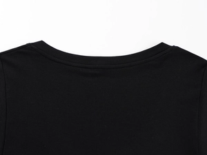 Close-up detail of premium tencel wool blend knit fabric and refined neckline stitching