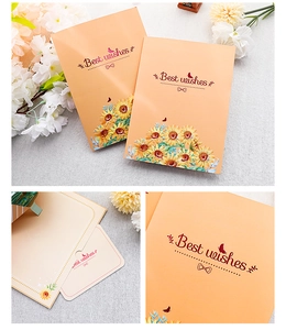 Detail of handmade greeting card set featuring sunflower illustrations and Best Wishes text