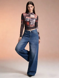 Fashionable high waist wide leg denim trousers with retro drape and loose fit design