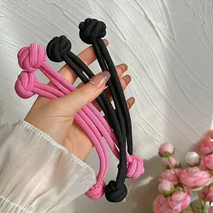 Élastiques à cheveux avec nœud à double brin en noir et rose pour femmes