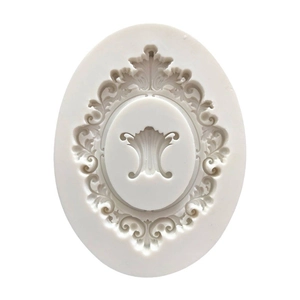 White silicone baroque frame fondant mold with intricate embossed relief patterns