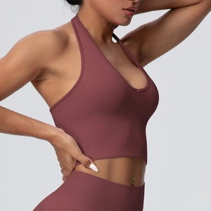 Detail view of the seamless ribbed yoga bra featuring halter neck and deep V neckline
