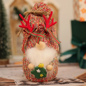 Christmas faceless gnome plush with knitted colorful hat and small green Xmas tree