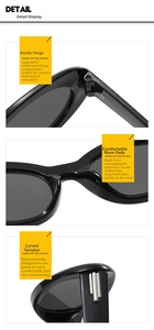 Detail view of reinforced metal hinges and ergonomic curved temples on black sunglasses