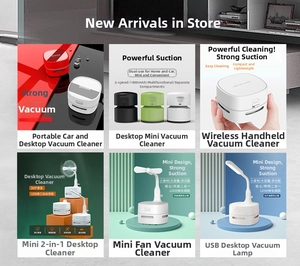 Mini desktop vacuum cleaner detail view, compact size and strong suction for clean desk.