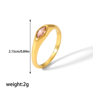 Detail view of 18K gold plated stainless steel signet ring with pink marquise gemstone