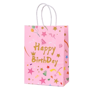 Pink Happy Birthday gift bag with gold lettering and colorful party balloon patterns