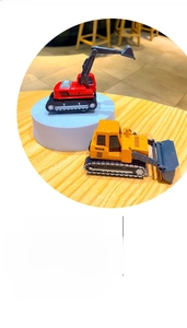 Detailed close-up of mini excavator and bulldozer toys with movable arms and tracks