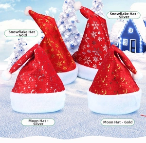 Detail of four Christmas hats featuring gold and silver snowflake and moon patterns