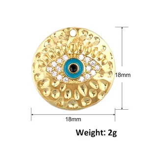 Detailed view of evil eye pendant showing 18mm diameter and 2g weight measurements
