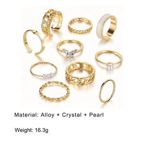 10-piece gold ring set featuring butterfly, pearl accents and chain link designs