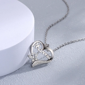 Polished silver heart pendant necklace with Mama lettering and butterfly details