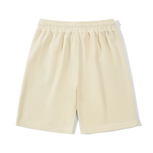 Detailed view of beige heavy cotton corduroy shorts with elastic waist and ribbed texture