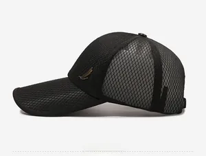 Detail view of black mesh baseball cap with vintage bronze feather metal emblem decoration