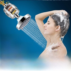 Detail of multi-stage filter shower head showing water flow and skin health benefits