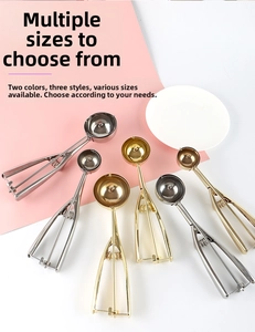 Close-up of stainless steel ice cream scoops in silver and gold with spring release