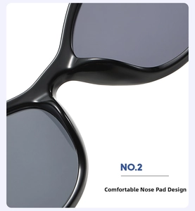 Detail of comfortable nose pads and sleek black frame of cat eye sunglasses