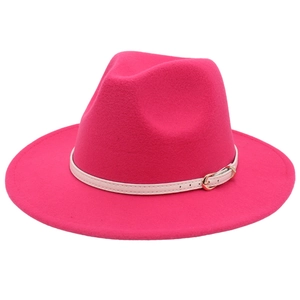 Fuchsia wide brim fedora hat with a white leather belt accessory and gold buckle