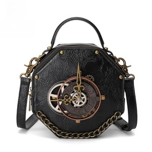 Detail showing vintage steampunk clockwork gears and chains on black leather bag