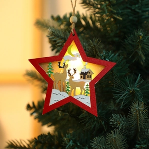 Red star-shaped wooden Christmas ornament with warm LED lights and reindeer forest scene