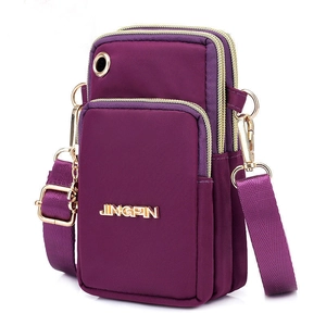 Minimalist purple nylon sports crossbody phone bag with multiple zipper compartments