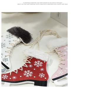 Detail of wooden ice skate Christmas ornaments with snowflake patterns and fur trim