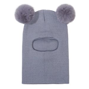 Detail of grey knitted kids balaclava featuring double faux fur pom-poms and neck warmer