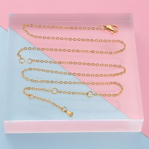 Detail of 18k gold plated stainless steel O-chain necklace with lobster clasp and extender