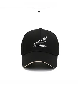 Close-up of Sunshine embroidery and wheat patterns on a black breathable baseball cap