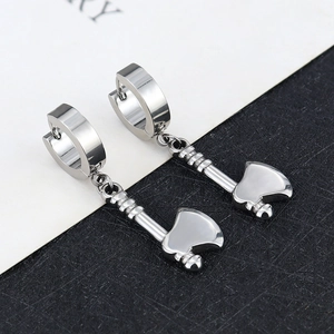 Close-up of silver axe pendant earrings with polished finish and round clicker hoops