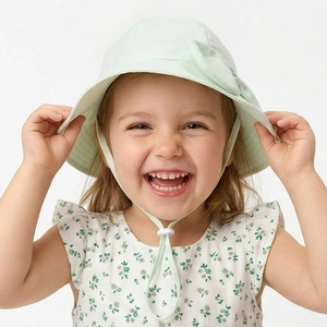 Girl's mint green wide brim sun hat with bow and adjustable drawstring for summer protection