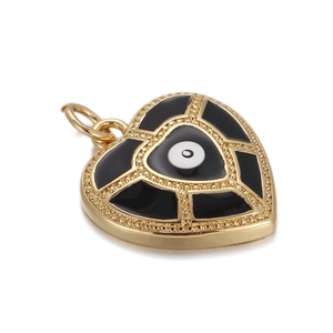 Close-up of heart pendant with black enamel finish and central evil eye design
