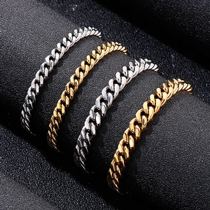 Minimalist Cuban link chain ring set for men in polished gold and silver steel finish