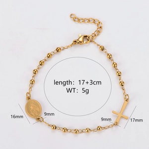 Gold stainless steel rosary bracelet with Virgin Mary medal and cross pendant on white back