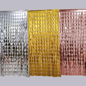 Square foil fringe curtains in silver, gold, and rose gold for party background decor