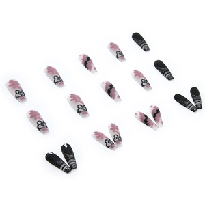 Long ballerina press-on nails with black glitter, rhinestones and heart floral designs
