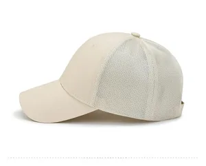 Side view of beige breathable mesh baseball cap with cotton front and curved brim