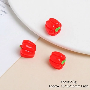 Detailed macro view of three miniature resin red peppers for DIY crafts, size 15x16mm