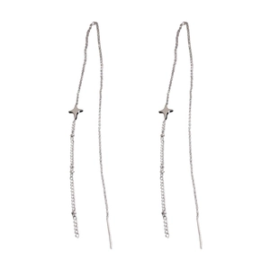 Elegant silver tassel earrings with four-pointed star pendants in a minimalist style