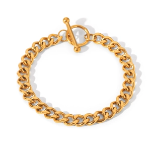Detailed view of a golden chunky chain bracelet with a stylish toggle clasp closure