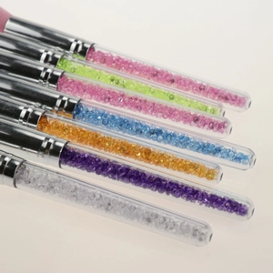 Set of seven sparkling rhinestone-filled nail art brushes with colorful acrylic handles