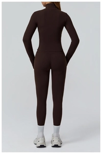 Back view of slim fit dark brown yoga set featuring high-stretch fabric and matte texture