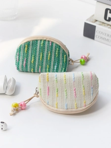 Handmade woven mini coin purses in green and beige with decorative colorful beaded tassels