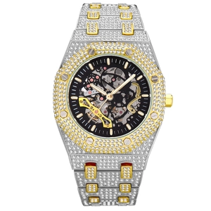Men's skeleton mechanical watch with iced-out diamonds and two-tone stainless steel band